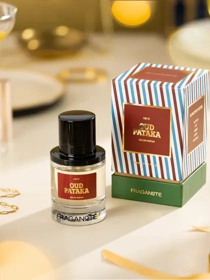 A festive shot for Fraganote's "Oud Pataka," crafted with a Diwali-inspired theme. Warm ambient lighting and bokeh effects create a radiant background that highlights the product and captures the spirit of celebration.