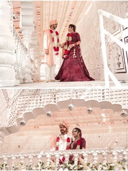 The couple framed by the intricate white architecture of the mandap. These shots highlight the beauty of the venue and the solemnity of the occasion.