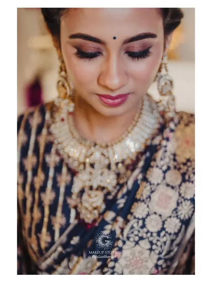 A close up on Prathima's eye makeup for her pellikuthuru ceremony. The soft brown and gold tones are perfect for a traditional yet modern look.