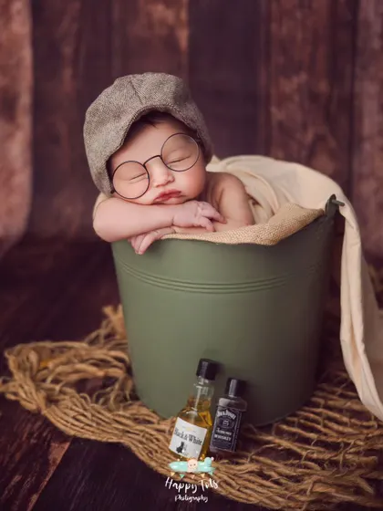 How adorable is this little scholar? We have a collection of cute props like these glasses and a newsboy cap to add a touch of personality to your newborn's session.