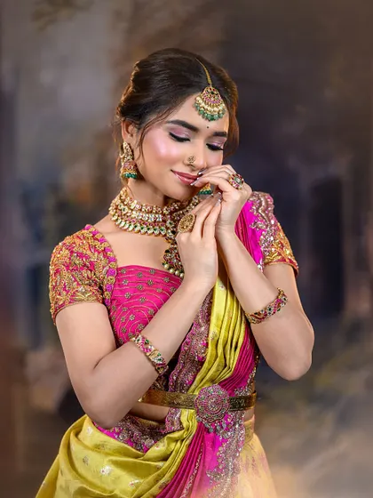 A joyful, candid-style shot of the model with her eyes closed. The soft makeup and beautiful smile create a heartwarming image.