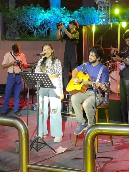 A throwback to my very first gig in Bangalore. Performing here with my guitarist felt like the start of a new chapter. You can see the whole crew capturing the moment.