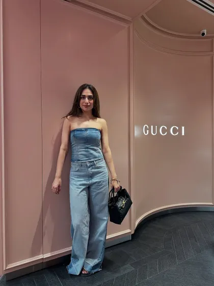 A full-length shot of the denim outfit, showing how the two different washes of denim work together.