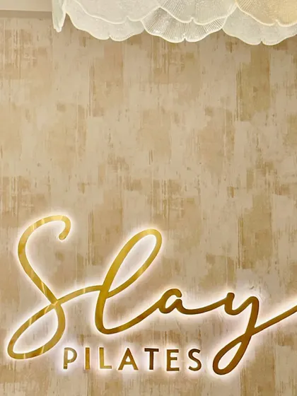 The official seal of slay. This sign at our GK1 studio is where the magic begins.