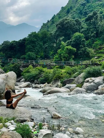 I am the mountains, the rivers, the city lights. Yoga teaches me to accept all aspects of myself and life. This pose, Upavistha Konasana (Wide-Angled Seated Forward Bend), by a mountain stream, is a moment of surrendering to that oneness.
