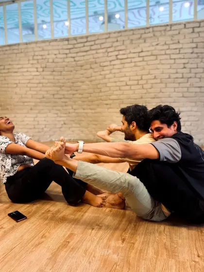 Stretch it out, feel the flow. This partner stretch requires trust and communication, helping to deepen flexibility and build connection.