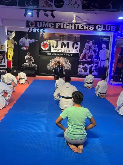 Students in the traditional seiza position during a special seminar, showing respect for the visiting master.