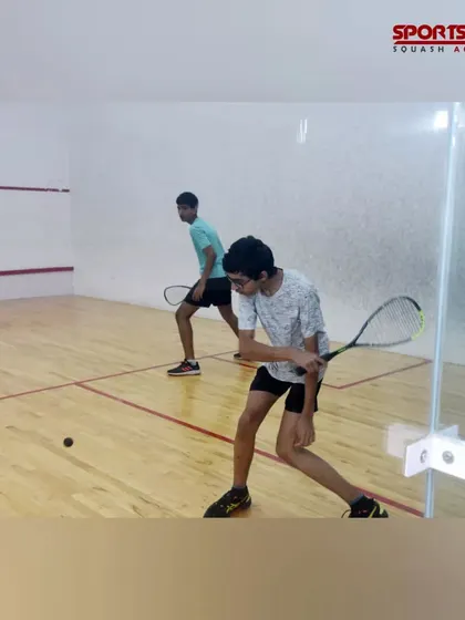 An action shot from our junior squash tournament, capturing a player lunging for a low shot. This is what dedication and training look like.