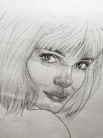 An A3 size graphite sketch of a girl's face. This was a quick 2-hour study focusing on the cross-hatching technique to create shadows and form.