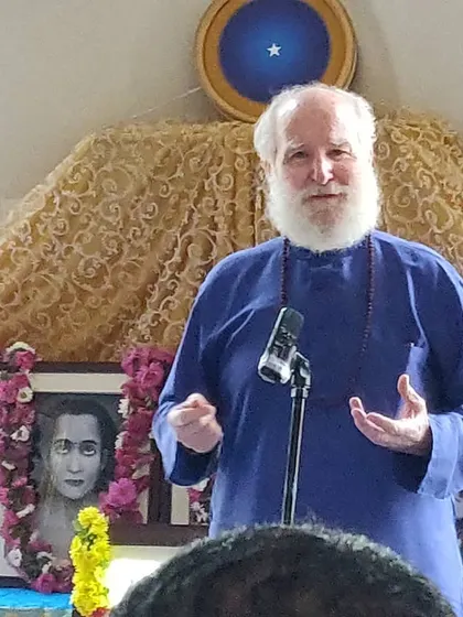 Nayaswami Haridas sharing wisdom and inspiration during a Sunday Satsang. Our talks are designed to be practical and heart-opening, translating deep spiritual principles into guidance for everyday living.