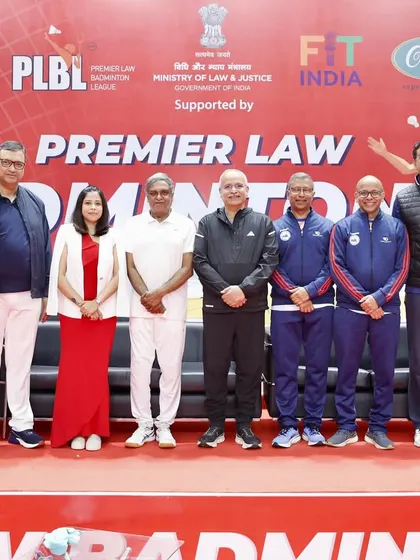 A group photo with dignitaries and players at the badminton league. Their encouragement was a great motivation for all the teams.