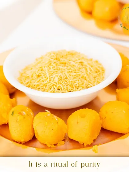 The Haldi ceremony is a ritual of purity and prosperity. The traditional sweets and snacks served are as much a part of the experience as the turmeric paste itself.