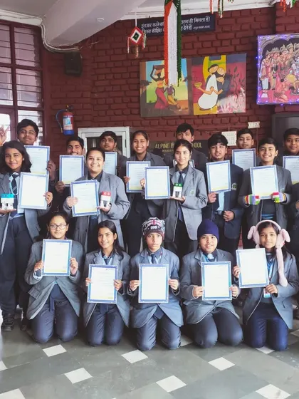 A proud moment for students as they hold up their certificates and projects after completing an ATL Lab workshop with us.