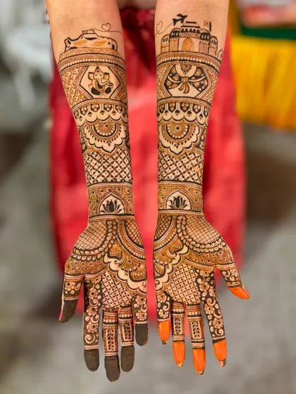 The full view of the travel-themed bridal mehendi. The custom elements on the arms are balanced with traditional patterns on the palms and fingers.