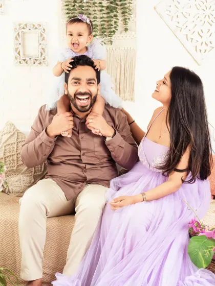 Pure joy and laughter in this candid family photo. We love capturing the fun, real moments.