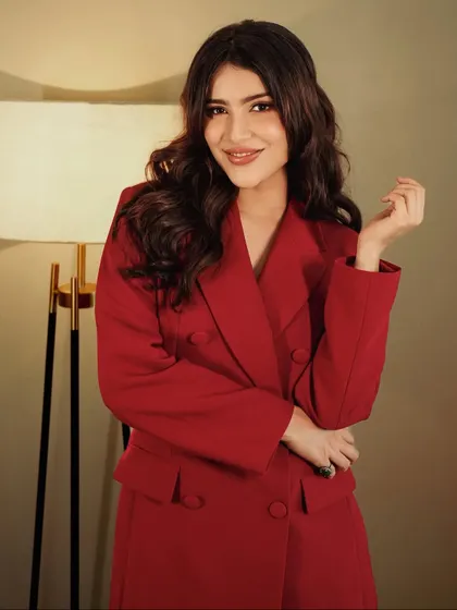 Boss vibes only. Khanzaadi looking powerful and chic in her red blazer dress.