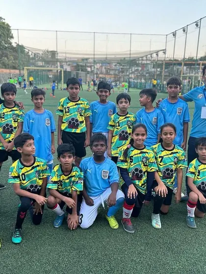 Our U-10 team posing with the opposition before a match in the MCFC Grassroots League. We teach our players sportsmanship and respect for their opponents.