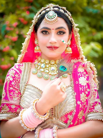 An outdoor bridal portrait using natural light. The soft background and focus on the subject's expression create a timeless and elegant feel.