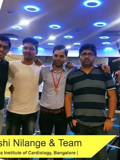 Even during a group event, individual excellence shines through. The gentleman in the center was one of the top performers of his team and proudly wears his champion's medal.