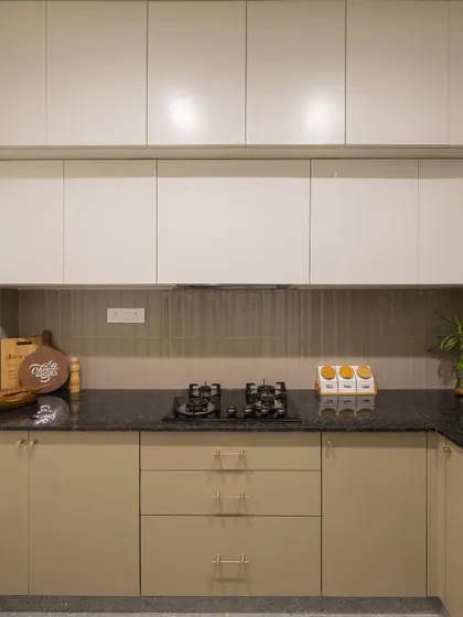 A straight-on view of the kitchen, showing the clean lines of the cabinetry and the well-organized cooking space.