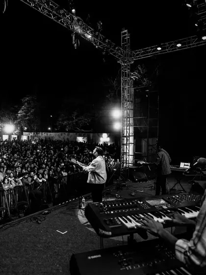 A black and white shot of the band and the incredible Jaipur crowd. The energy was electric that night. This is the connection we strive for at every show.