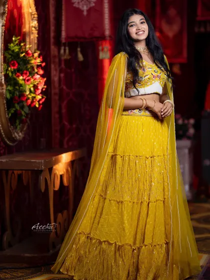 Actress Rachana Inder looking radiant in my yellow tiered lehenga for a Diwali shoot. This shows how my outfits are perfect for festive photoshoots and celebrations.
