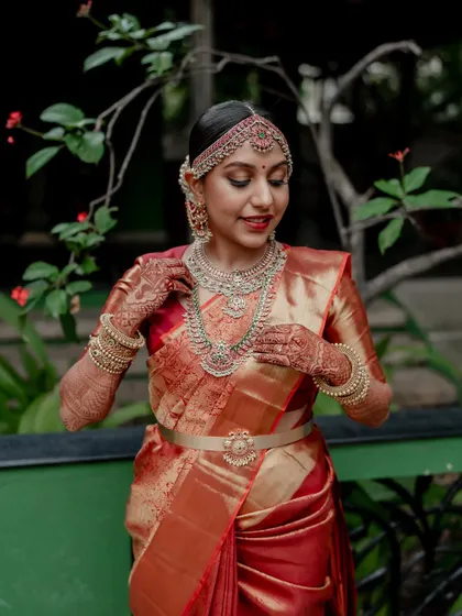A moment of quiet connection amidst the grandeur of The Tamarind Tree. We love using the venue's stunning architecture to frame our couples, creating a story of romance and tradition.