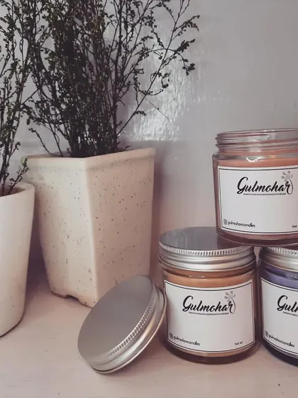 A collection of my custom-labeled jar candles. You can create your own signature scent with me.