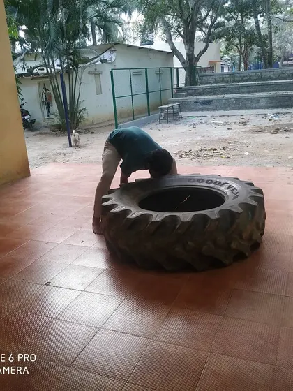 Preparing for a heavy lift. This kind of training builds the grit required for martial arts.