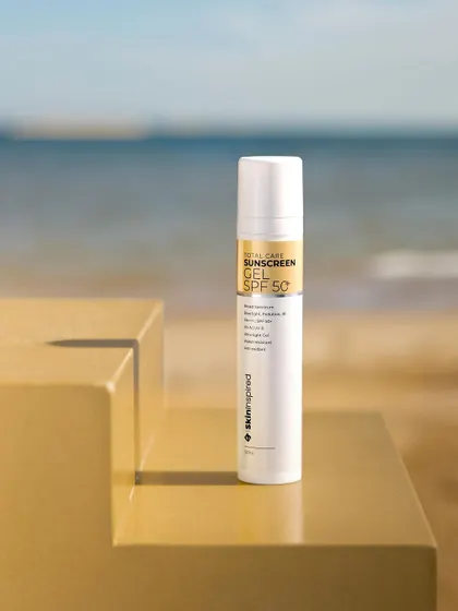 This image combines studio photography with AI. We shot the sunscreen on a prop with lighting to match a beach scene, then used generative AI to create the realistic beach background, showcasing our ability to blend techniques for the perfect shot.