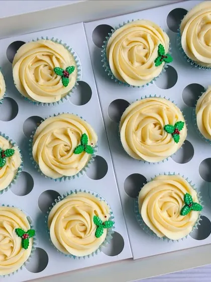 It’s beginning to look a lot like Christmas with these elegant cupcakes. I top them with a simple, classic buttercream rosette and a touch of festive holly for a clean and jolly look.