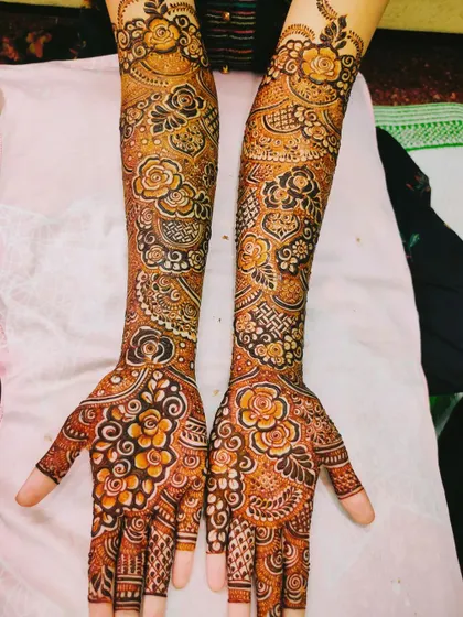 The beautiful orange-brown stain of a fresh bridal mehndi, a sign of a deep, dark color to come.