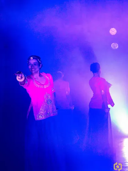 A moment of connection with the audience during our "Mumal" act. The stage lighting and smoky atmosphere helped transport everyone to the world of our story.