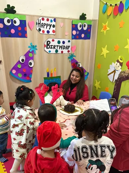 The whole class gathers around to sing "Happy Birthday," making the birthday girl feel special and loved.