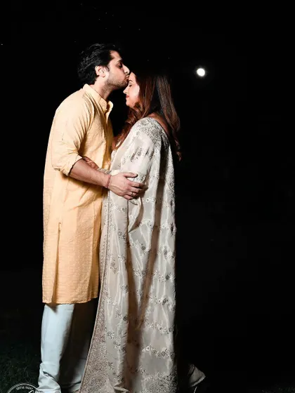 An intimate moment from a Karwa Chauth festival shoot. Using the soft moonlight and minimal artificial light, I captured the romance and tenderness of the couple as they celebrated their bond. This type of low light photography creates a dramatic and emotional feel.