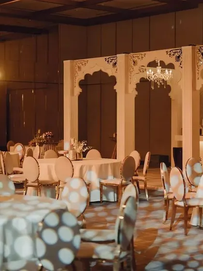 This was more than just a bar; it was an imperial experience. We designed a grand, walk-in bar that became a central feature of the event, framed by regal arches and elegant chandeliers.