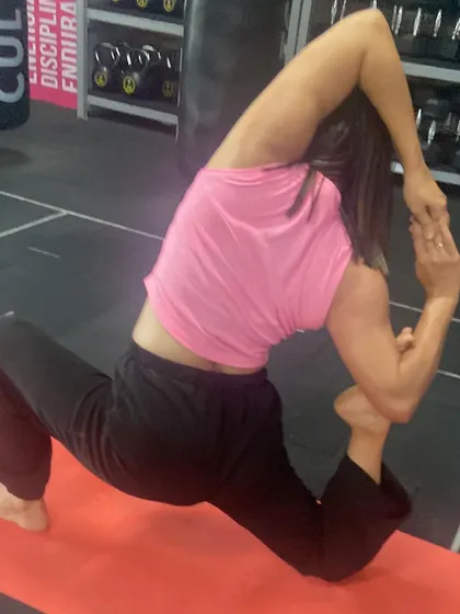 A deep stretch in a variation of lizard pose on International Yoga Day. This pose is great for opening the hips and preparing for deeper backbends.