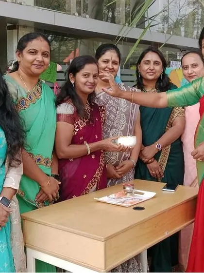 Our teachers share a moment of celebration, enjoying the festive treats during the Makar Sankranti event.