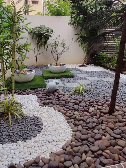 A garden can be beautiful without being high-maintenance. I love designing with pebbles to create artistic, textured landscapes that look stunning all year round with very little upkeep.