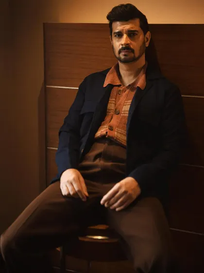 A quiet, introspective portrait of Tahir Raj Bhasin. My goal in a celebrity portrait session is to find the person behind the persona. The warm lighting and relaxed pose create a sense of calm, allowing for an authentic and soulful character study.
