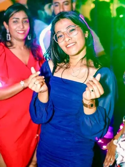 A guest smiling and enjoying the music, a common sight on my dance floors.