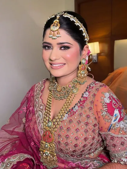 A smiling bride is a beautiful bride. This close-up captures the joy and radiance of the moment, enhanced by a fresh and glowing makeup look.