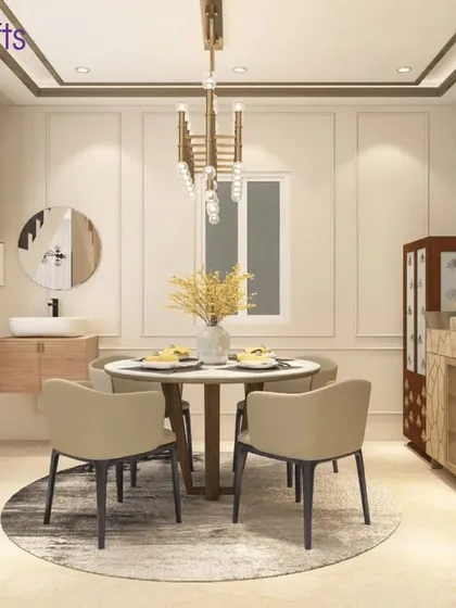 Step into your dream dining space. This design features a round table, perfect for conversation, set against a backdrop of classic wall molding and a modern chandelier.