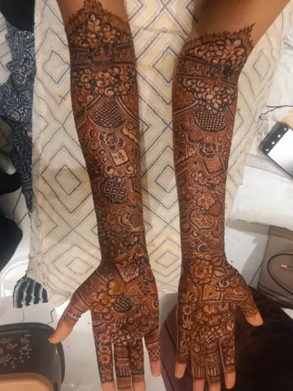 Fatima's bridal mehndi, a full coverage design that is both intricate and beautiful. I love creating these detailed pieces for my brides.