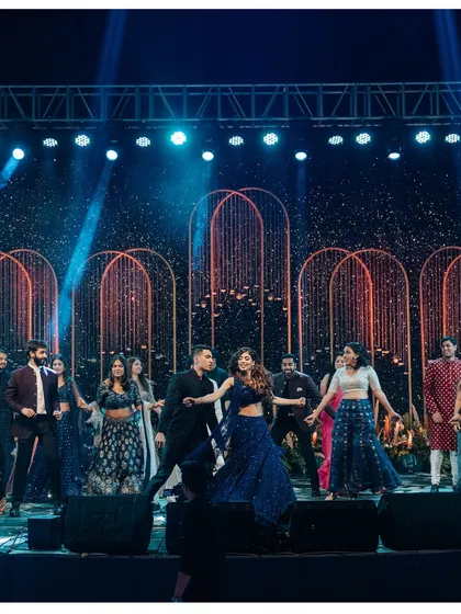 The grand finale of a group dance performance. We design stages with impressive lighting rigs and backdrops that make every sangeet performance look and feel spectacular.