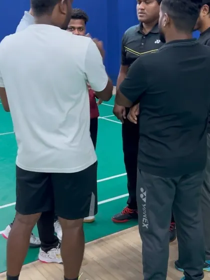 Coaches engage in a group discussion during a practical session. Peer-to-peer learning is a vital part of my program, allowing participants to share insights and solve problems together.