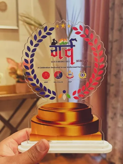 This 'Garv' trophy is a cherished memento from a celebration dedicated to our uniformed forces. Performing at this event was a personal tribute to my father, a police officer, and to all who serve our nation.