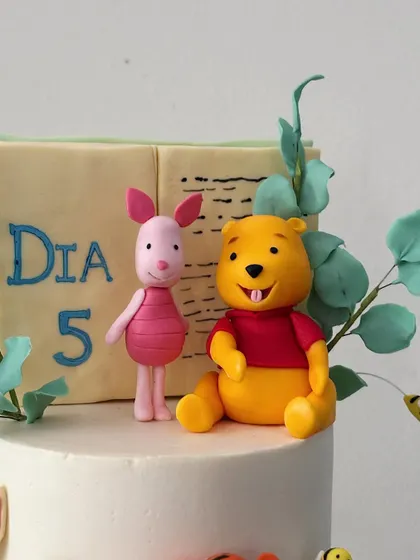 A close-up of the hand-sculpted Pooh and Piglet figurines. Getting these tiny details right is my favorite part of the process.