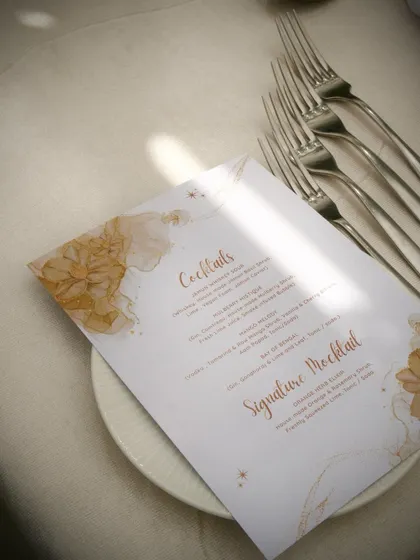 Another shot of the beautifully designed cocktail menu, hinting at the delicious drinks to come.