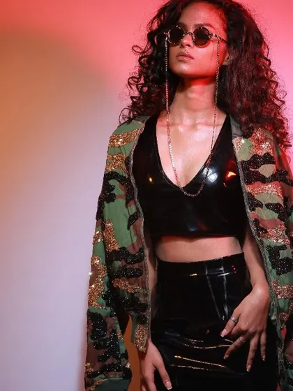 A portrait from the Diseno.in shoot, capturing the model's cool attitude and the details of the sequined jacket.